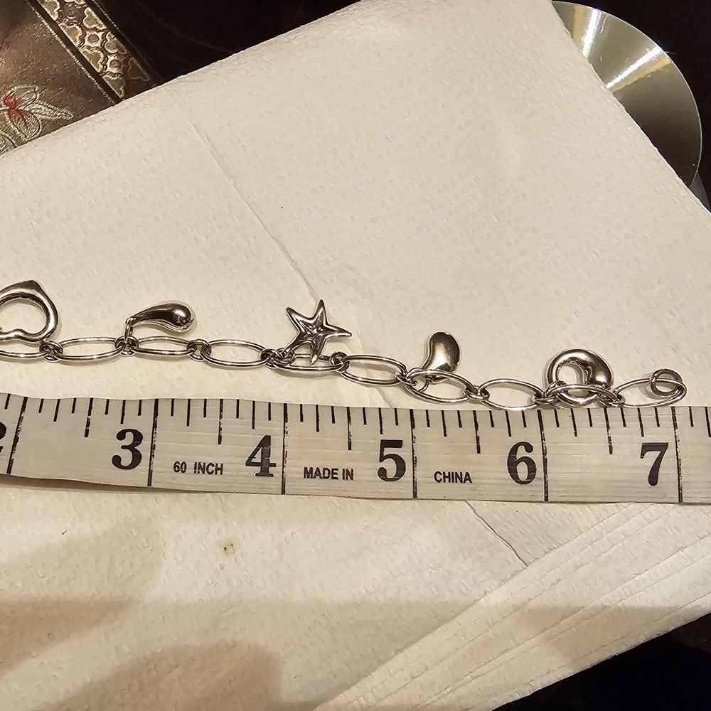 Tiffany & Co. Silver Charm Bracelet with Star and Heart